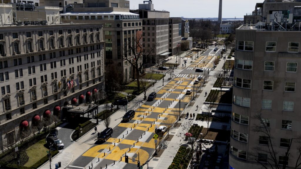 City crews have begun painting over the 'Black Lives Matter' street mural in D.C. : NPR