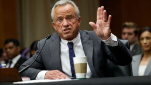 RFK Jr. defends changing COVID vaccine schedule in memo to Congress : NPR