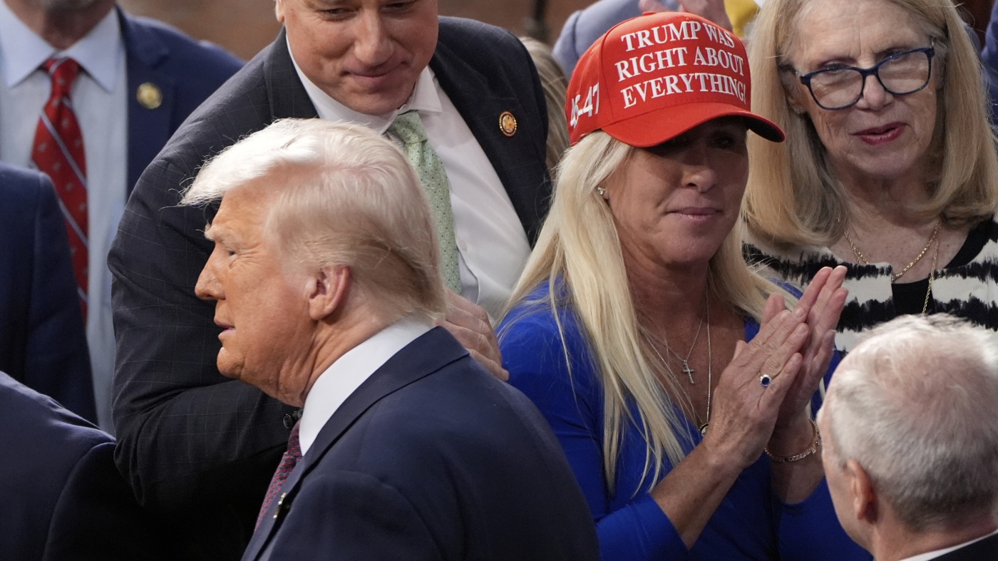 MTG says Trump policies are 'not America first' in fight over MAGA : NPR