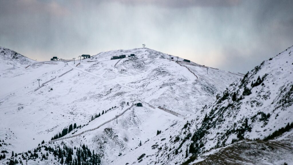 U.S. ski resorts are bracing for a steep drop in international travel due to politics : NPR