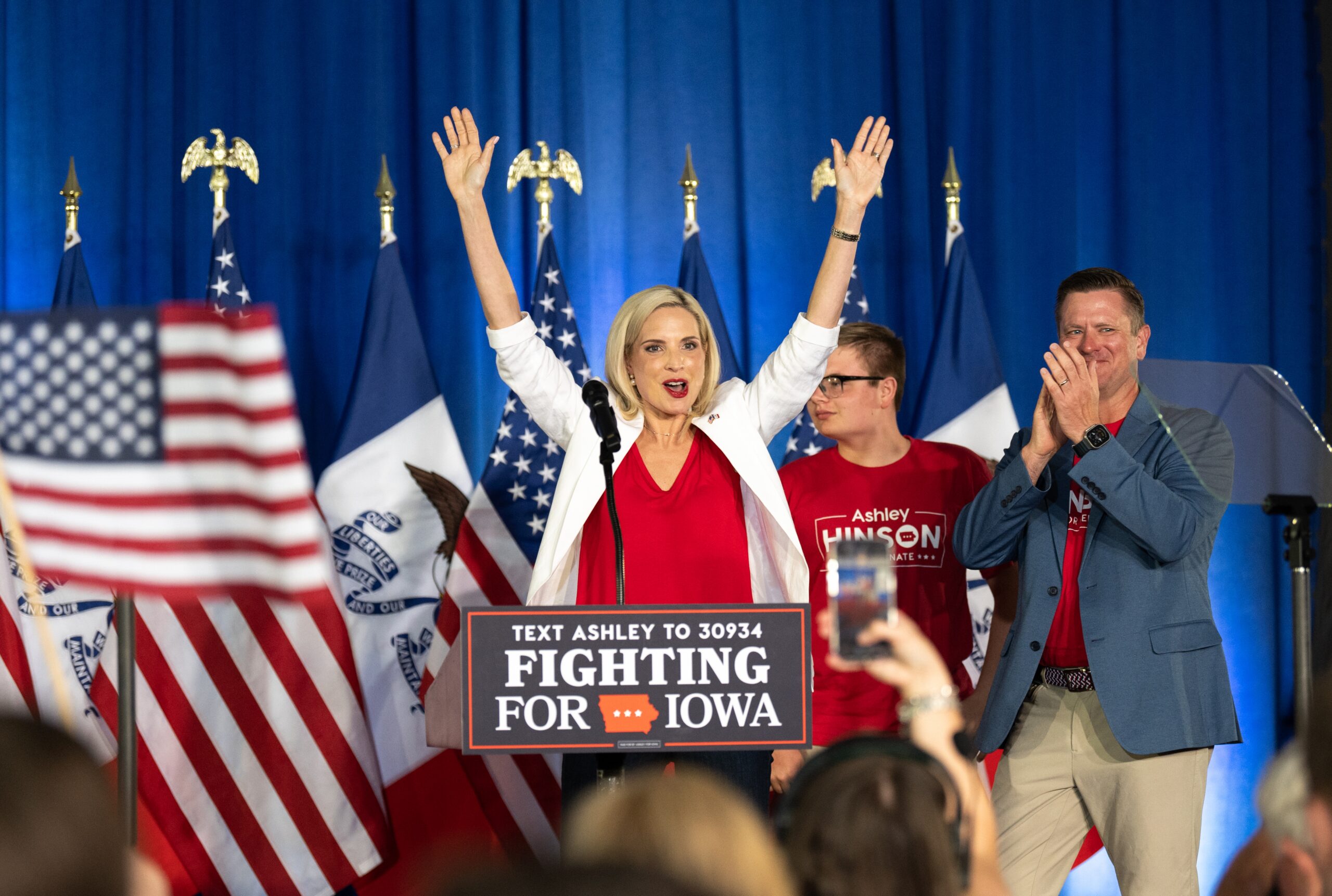 Republican candidate for Senate, U.S. Rep. Ashley Hinson (R-Iowa) celebrates on stage with her family during a primary night election party on June 2, 2026 in Cedar Rapids, Iowa. Hinson won the Republican nomination to fill the seat vacated by Sen. Joni Ernst.