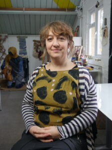 Christian artist removed from her own exhibition over transgender remarks settles with council