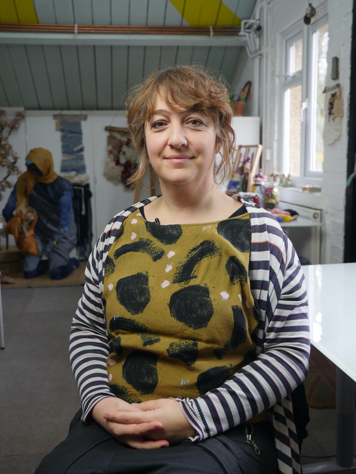 Christian artist removed from her own exhibition over transgender remarks settles with council