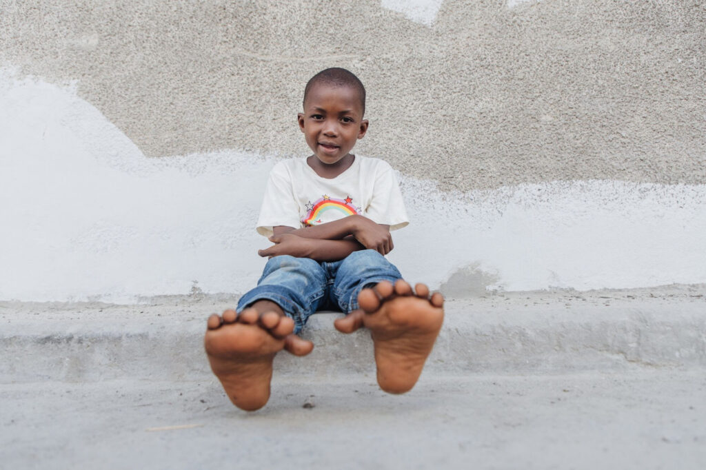 Boy born with six toes on each foot receives life-changing help from Christian charity