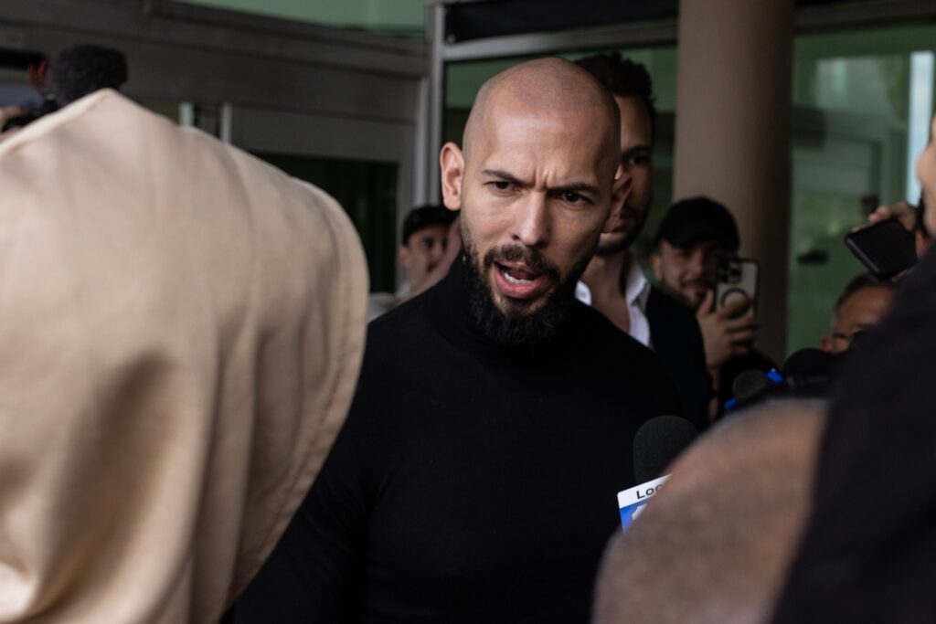 Andrew Tate Arrested After Extradition Request from the UK The Moral Compass News Andrew Tate and Tristan Tate (obscured) — facing more than 50 charges in the U.K. and Romania, including rape and human trafficking — arrive in Florida after a travel ban on them was lifted in February 2025.